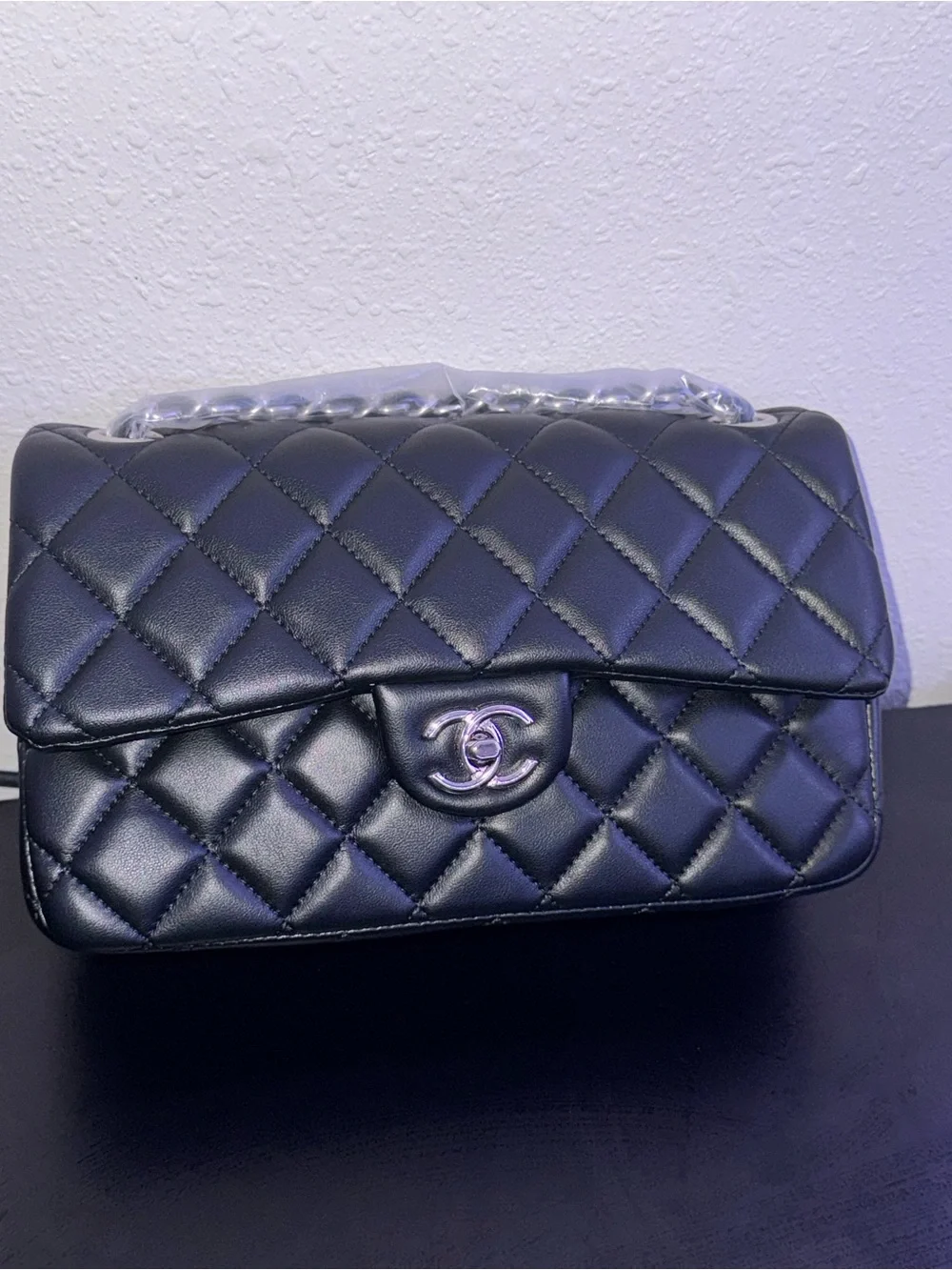 Black Quilted Leather Shoulder Bag with Chain Accent